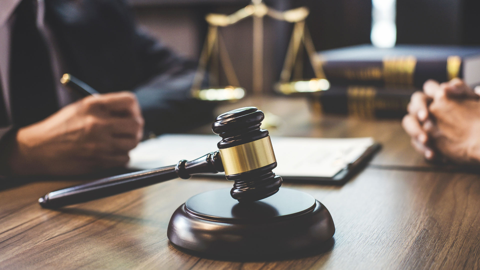 Law firm professionals working securely